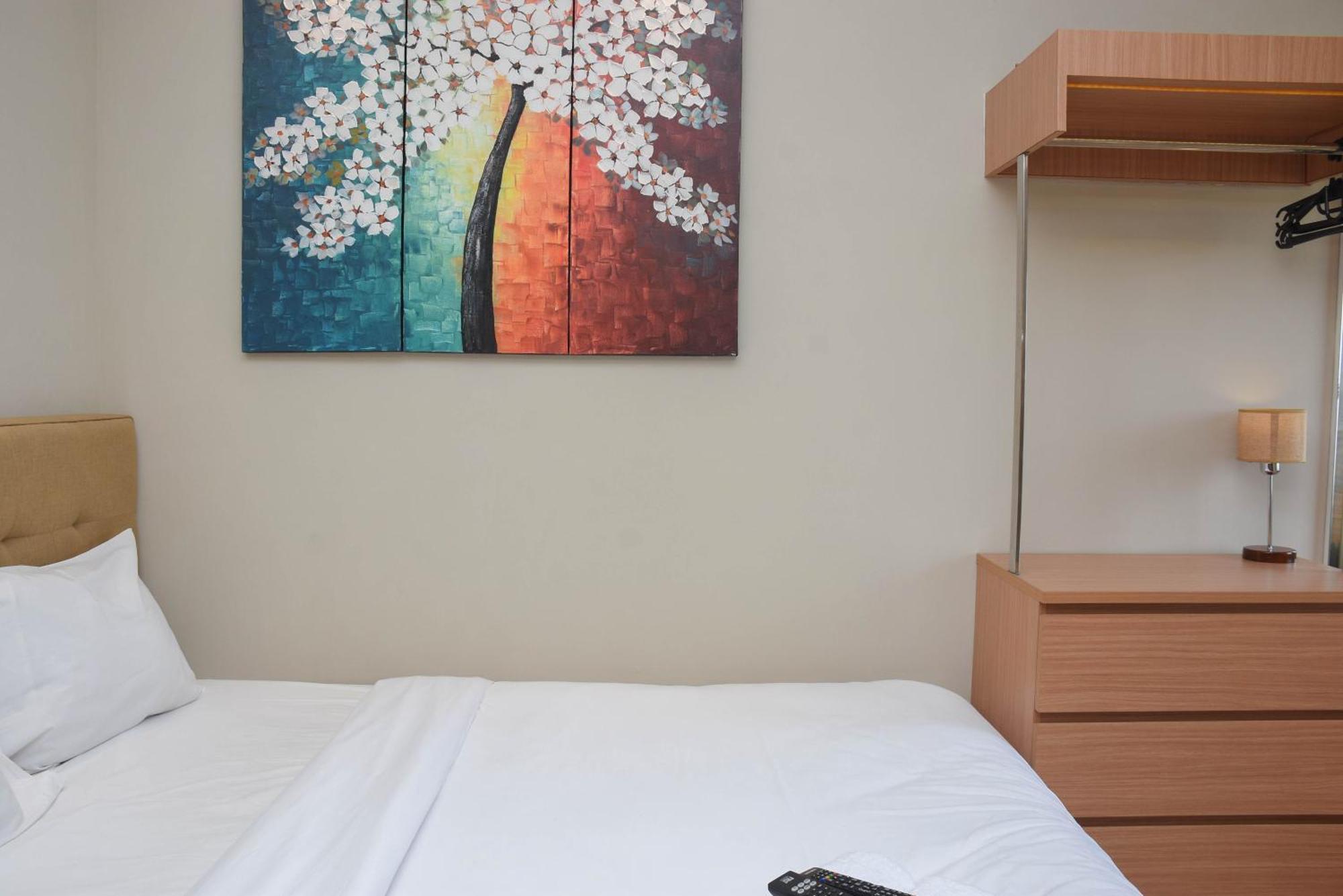 Cozy Living At Springlake Summarecon By Travelio Apartemen